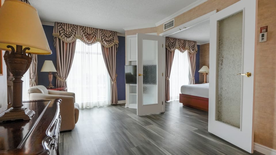 Suite, 1 Bedroom | Living area | 32-inch flat-screen TV with cable channels, TV