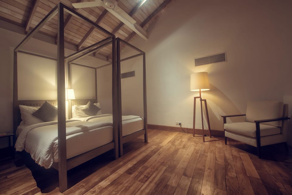 Upper Family Suite | Minibar, in-room safe, desk, iron/ironing board