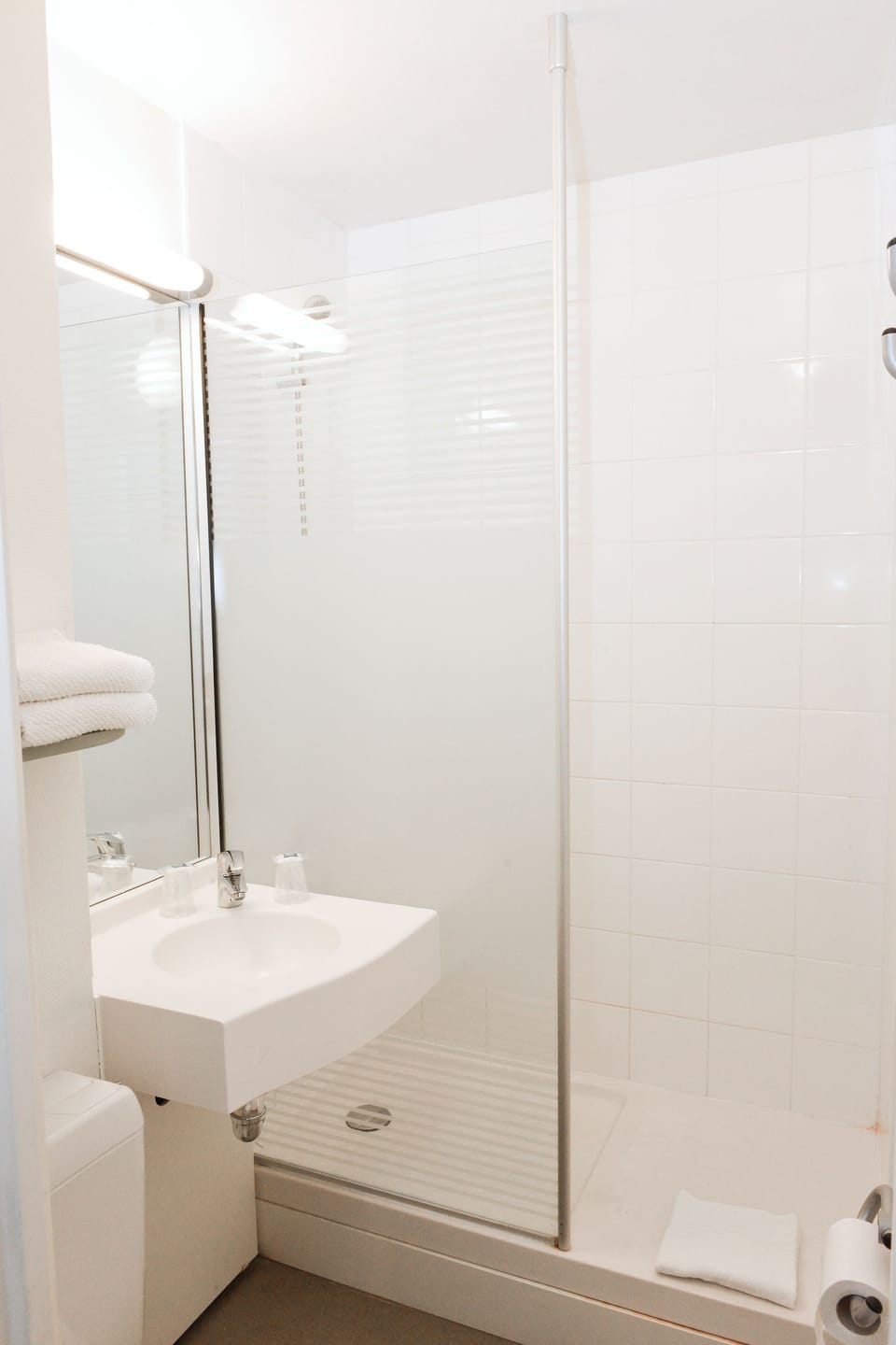 Shower, eco-friendly toiletries, hair dryer, towels