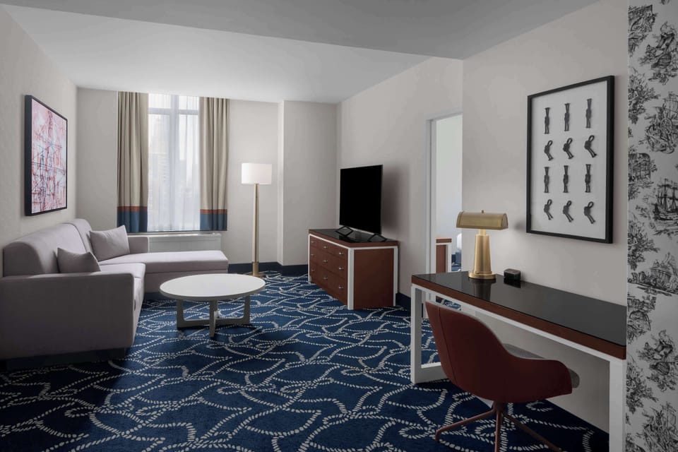 Suite, 1 King Bed, Non Smoking | Living area | 40-inch LCD TV with premium channels, TV