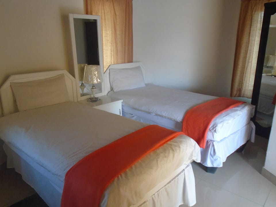 Standard Room | Desk, bed sheets