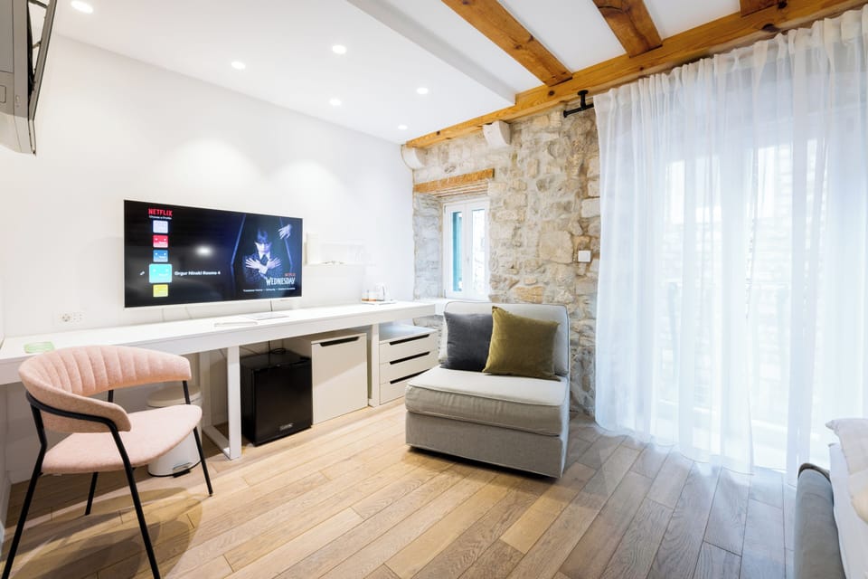 Delux Double Room, Balcony, City view | Minibar, in-room safe, desk, blackout drapes