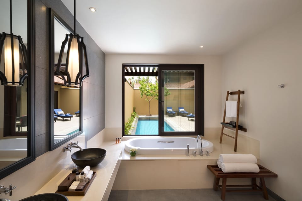 Separate tub and shower, free toiletries, bathrobes, slippers