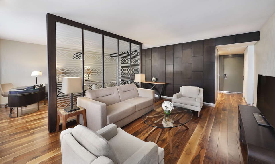 Executive Suite, 1 King Bed (Ambassador) | Living area | TV, MP3 dock