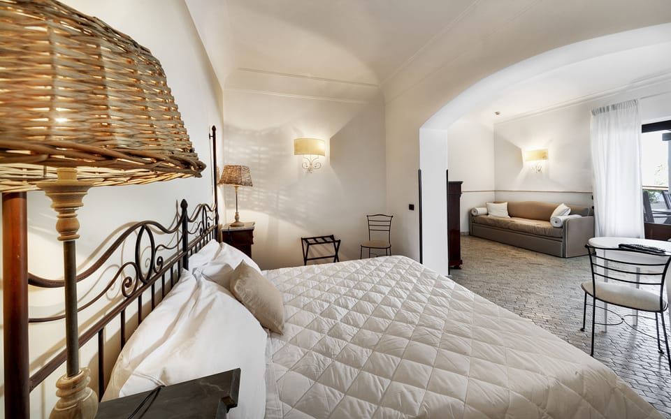 Junior Suite, Terrace, Sea View | Minibar, in-room safe, desk, blackout drapes
