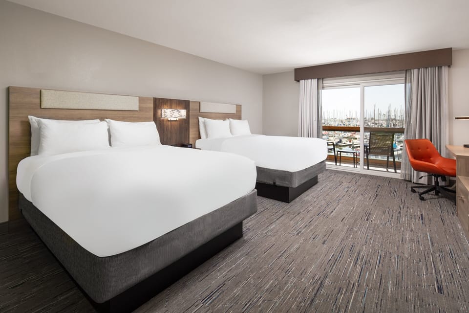 Standard Room, 2 Queen Beds, Harbor View | In-room safe, desk, blackout drapes, iron/ironing board