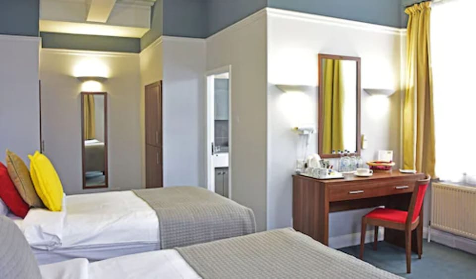 Standard Triple Room | In-room safe, desk, blackout drapes, iron/ironing board