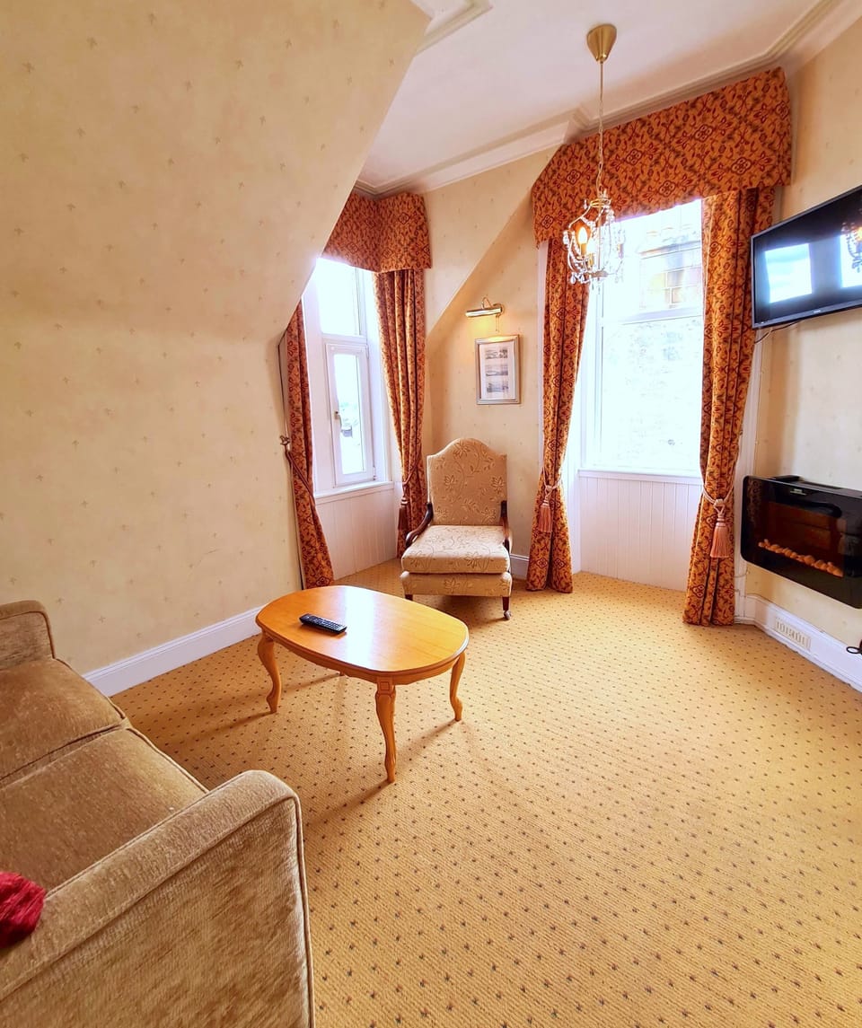 Junior Suite, Sea View (Room 10) | Living area | Flat-screen TV, DVD player