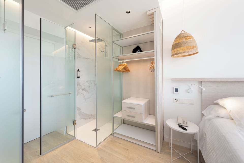 Eco-friendly toiletries, hair dryer, towels