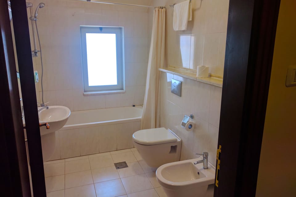 Desk, blackout drapes, soundproofing, WiFi (free)