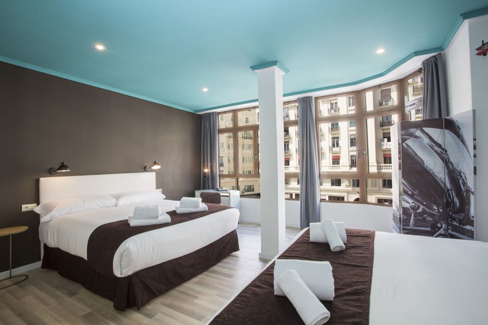 Quadruple Room, City View | Premium bedding, individually decorated, blackout drapes
