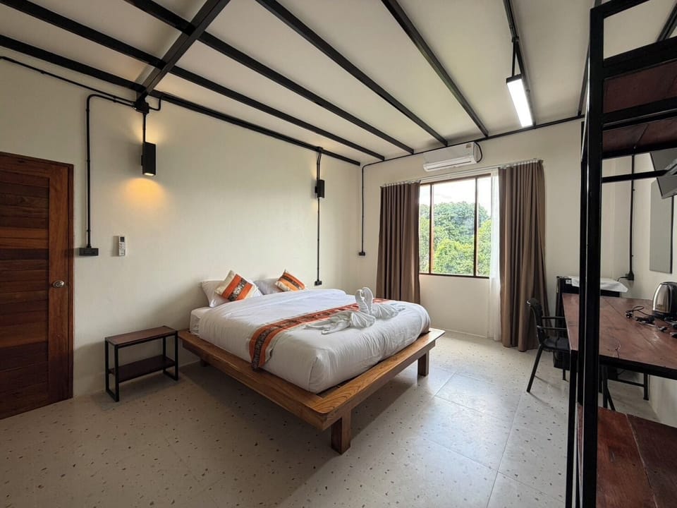 Family Room, Pool View | Desk, laptop workspace, WiFi (free), individually decorated