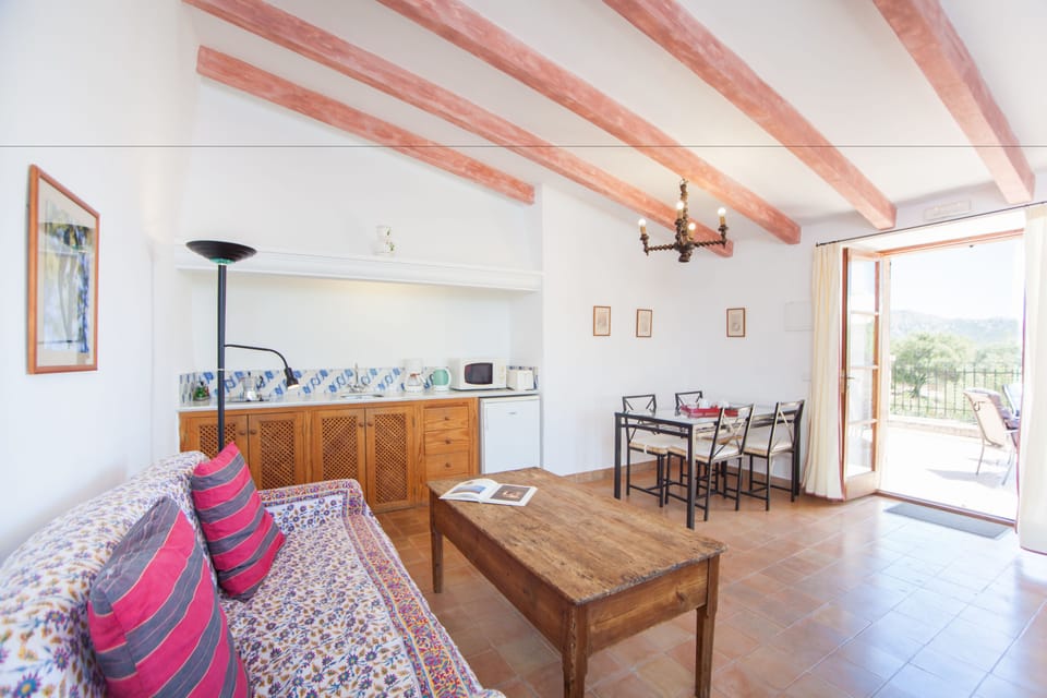Superior Apartment, 1 Bedroom | Living room | 22-inch TV with satellite channels