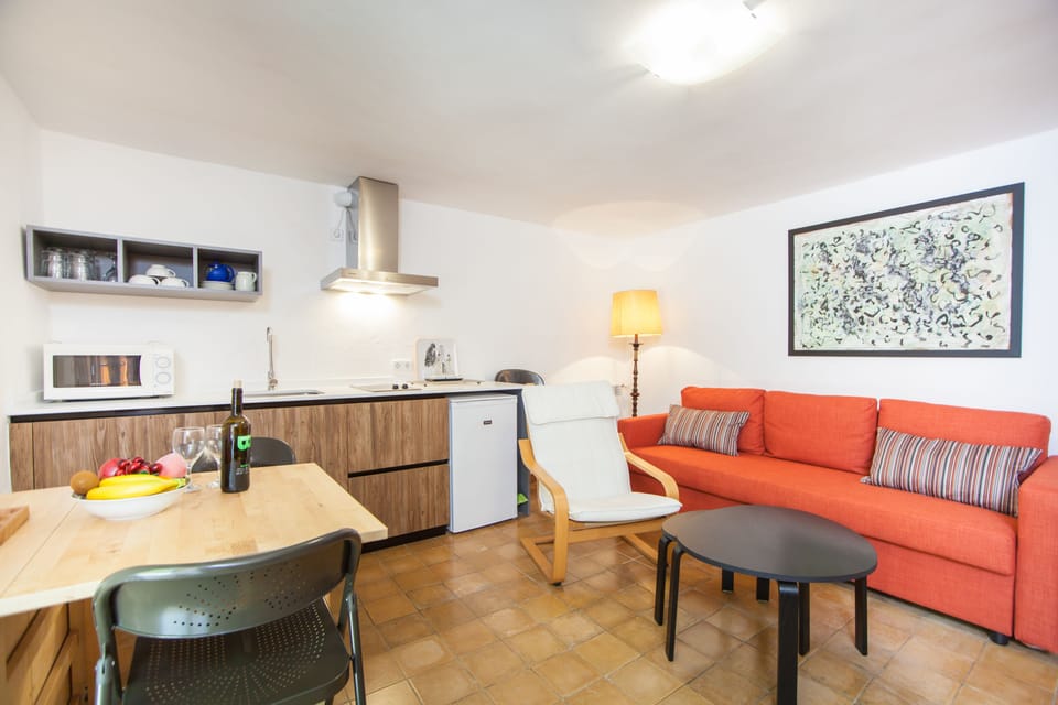 Standard Apartment, 1 Bedroom | Living area | 22-inch TV with satellite channels