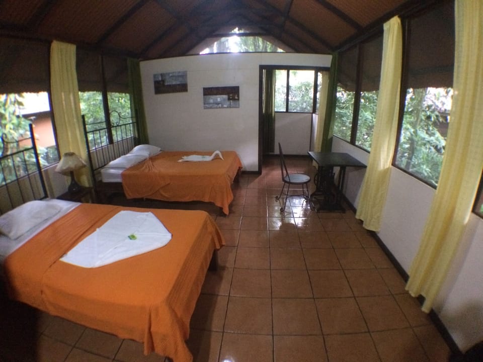 Cabin, Balcony, Garden View | In-room safe, desk, bed sheets
