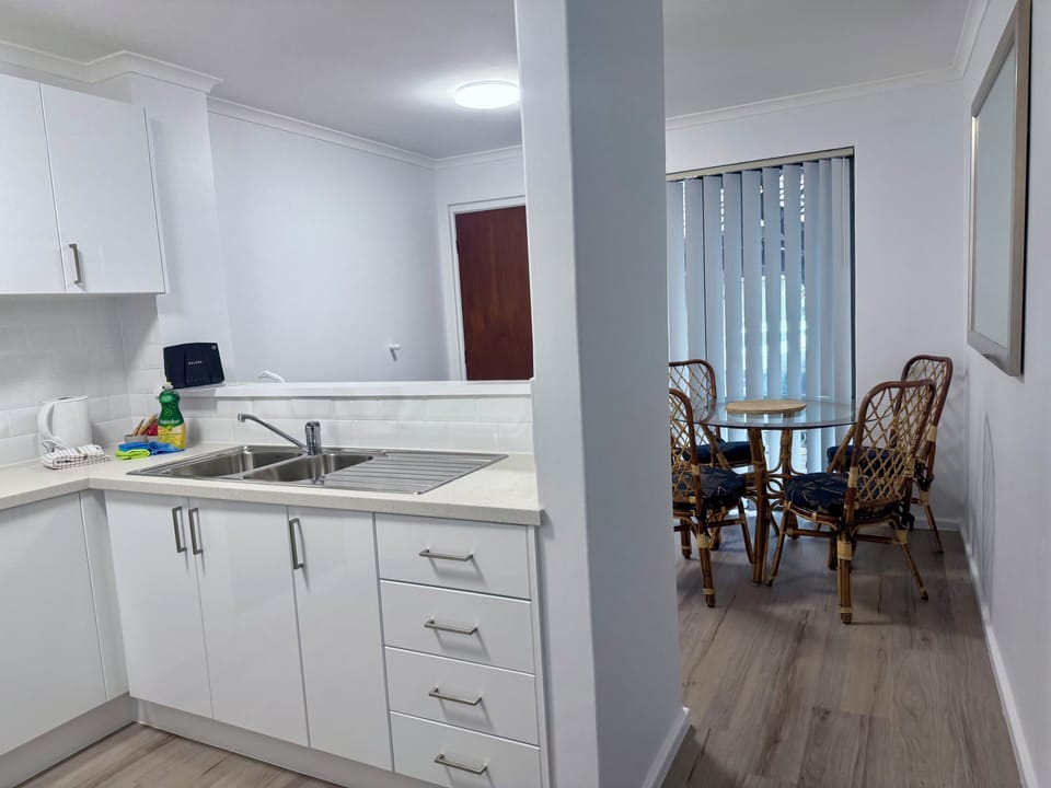 Premier Family Apartment, 2 Bedrooms (1 Queen, 1 Tri-bunk and 1 Sofa bed) | Private kitchen | Full-size fridge, microwave, oven, stovetop