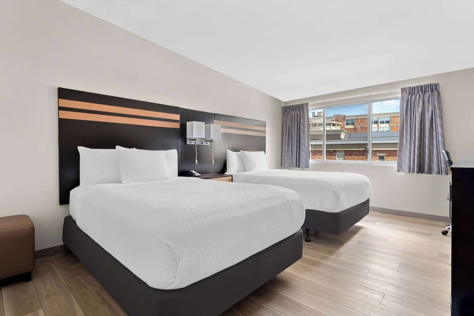 Standard Room, 2 Queen Beds | Iron/ironing board, rollaway beds, free WiFi, bed sheets