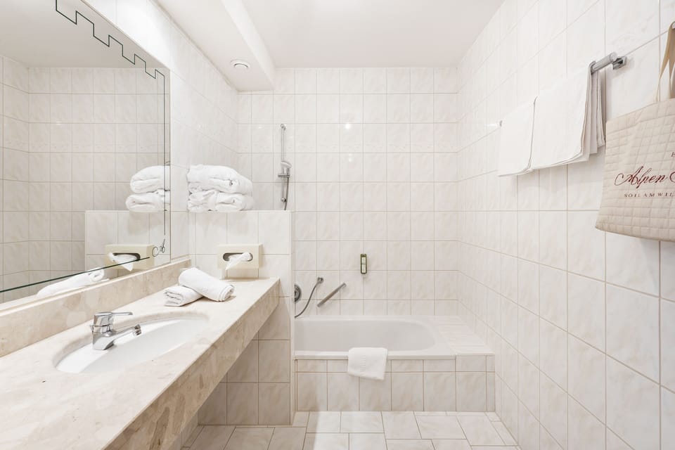 Combined shower/tub, free toiletries, hair dryer, bathrobes