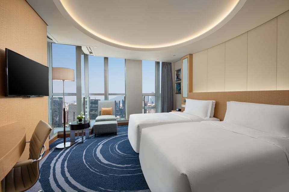 Premium bedding, down comforters, minibar, in-room safe