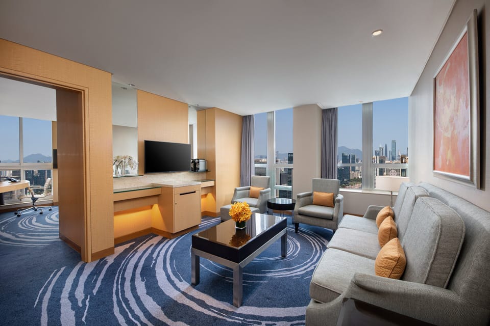 Premium bedding, down comforters, minibar, in-room safe