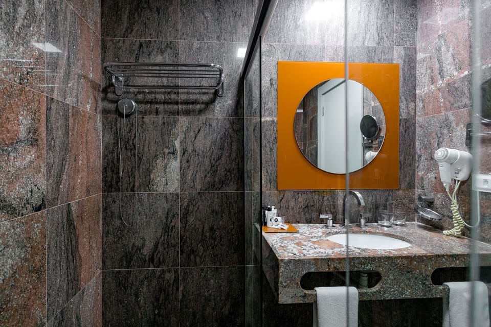 Shower, free toiletries, hair dryer, towels