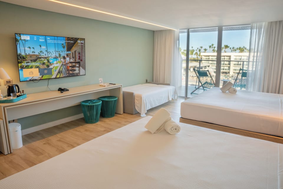 Deluxe Room with Sofa Bed | Minibar, in-room safe, free WiFi, bed sheets