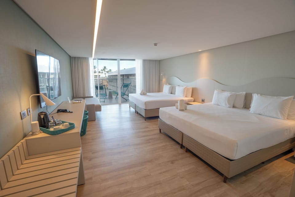 Deluxe Room with Sofa Bed | Minibar, in-room safe, free WiFi, bed sheets