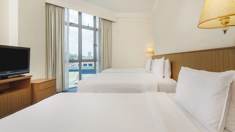 Standard Triple Room | In-room safe, desk, laptop workspace, iron/ironing board (on request)