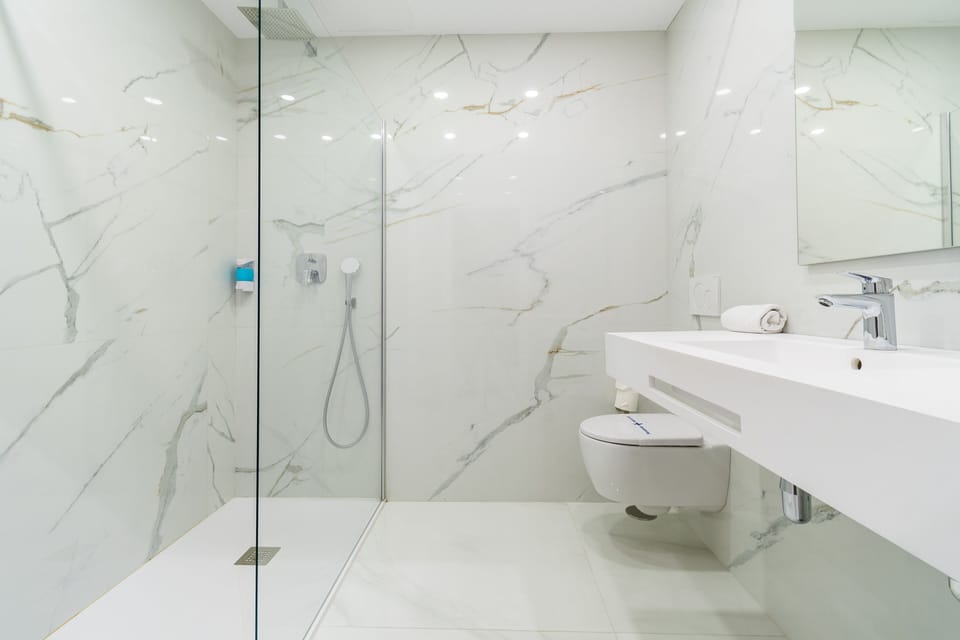 Junior Double Room, 1 Queen Bed | Bathroom | Separate tub and shower, deep soaking tub, hair dryer, towels