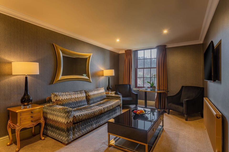 Suite, 1 King Bed, Non Smoking (Walk-in Shower;with Sofabed) | Desk, iron/ironing board, rollaway beds, free WiFi