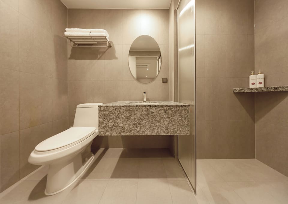 Superior Triple | Bathroom | Shower, hair dryer, bathrobes, towels