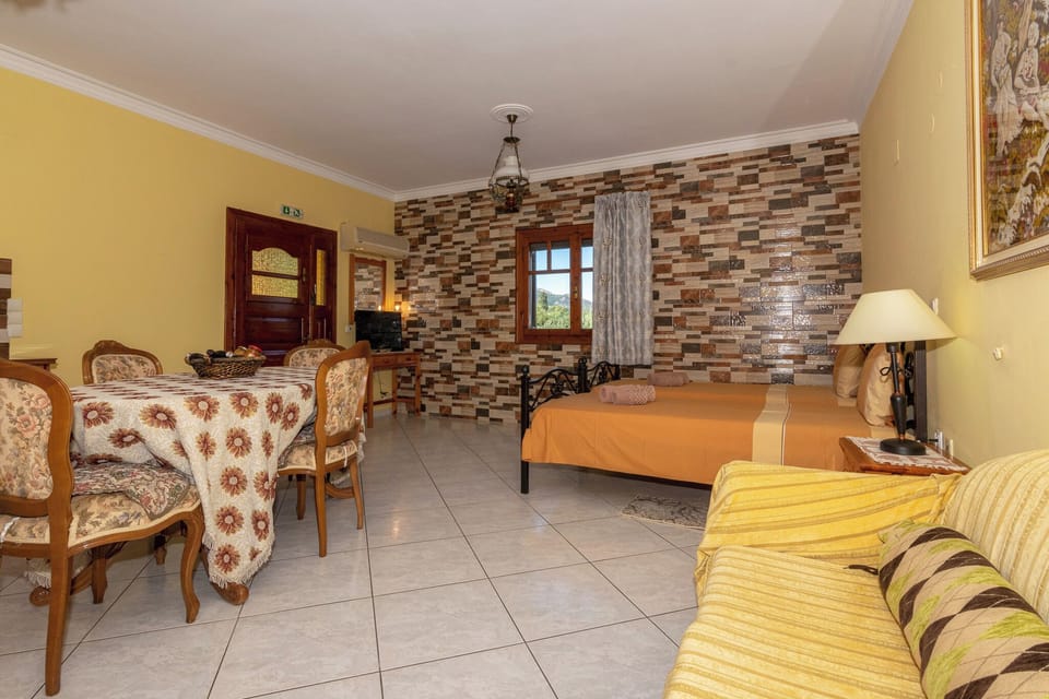 Apartment, 1 Bedroom | Living area | Flat-screen TV