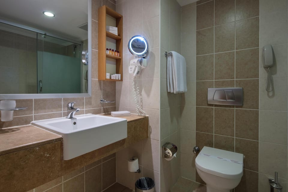 Shower, free toiletries, hair dryer, bathrobes