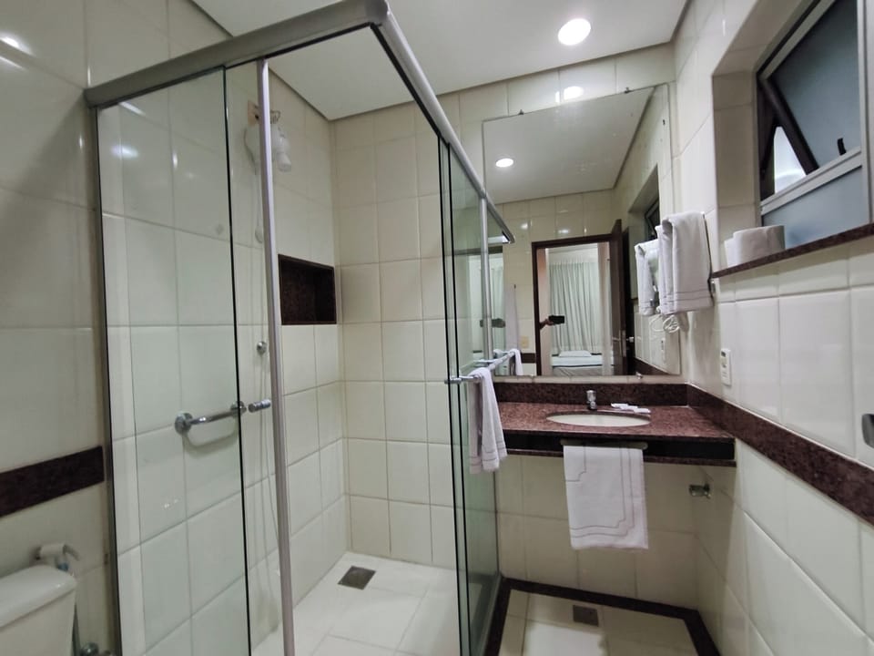 Premium Triple Room | Bathroom | Shower, towels, soap, toilet paper