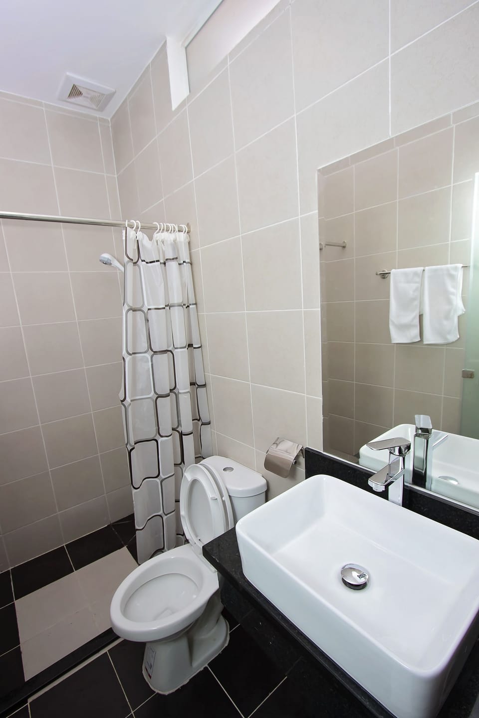 Shower, free toiletries, hair dryer, slippers