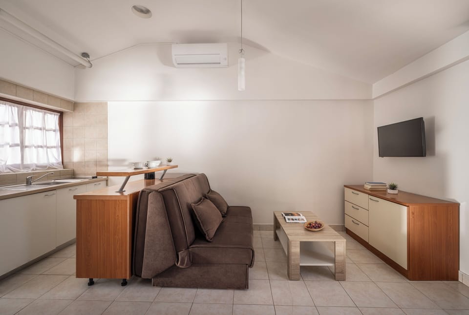 Premium Apartment, 2 Bedrooms, Terrace, Garden View | Living area | 64-cm TV with satellite channels