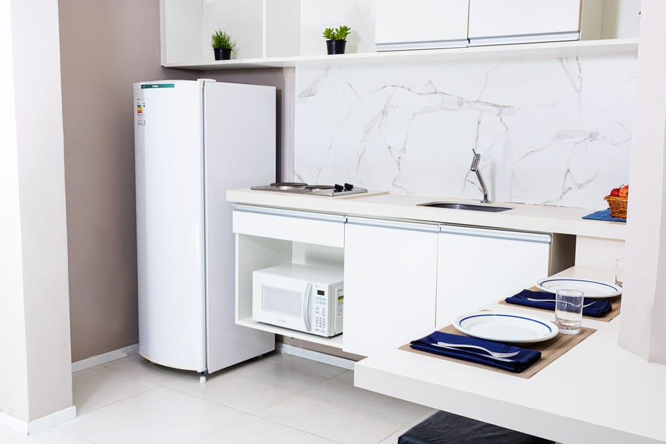 Fridge, microwave, stovetop, cookware/dishes/utensils