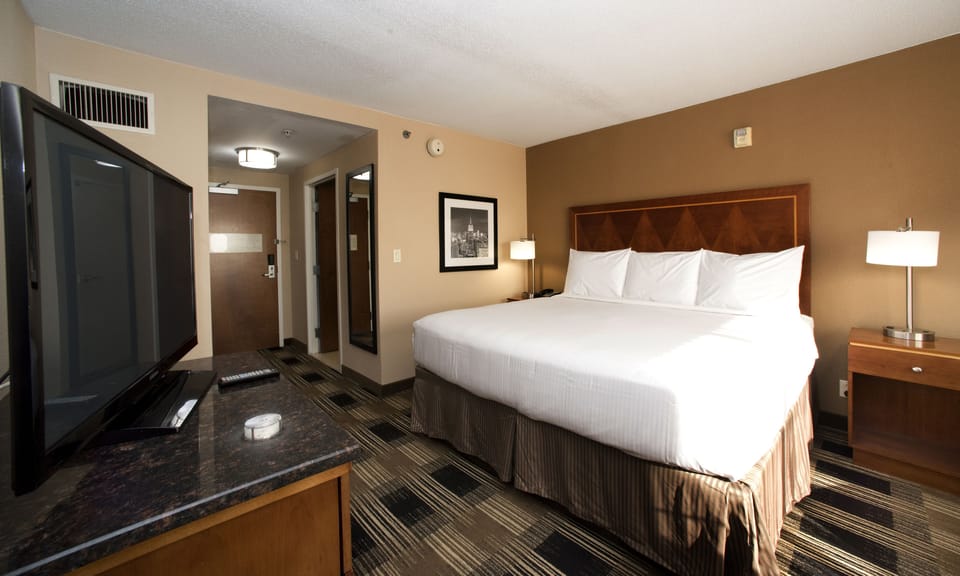 Hypo-allergenic bedding, down comforters, pillowtop beds, in-room safe