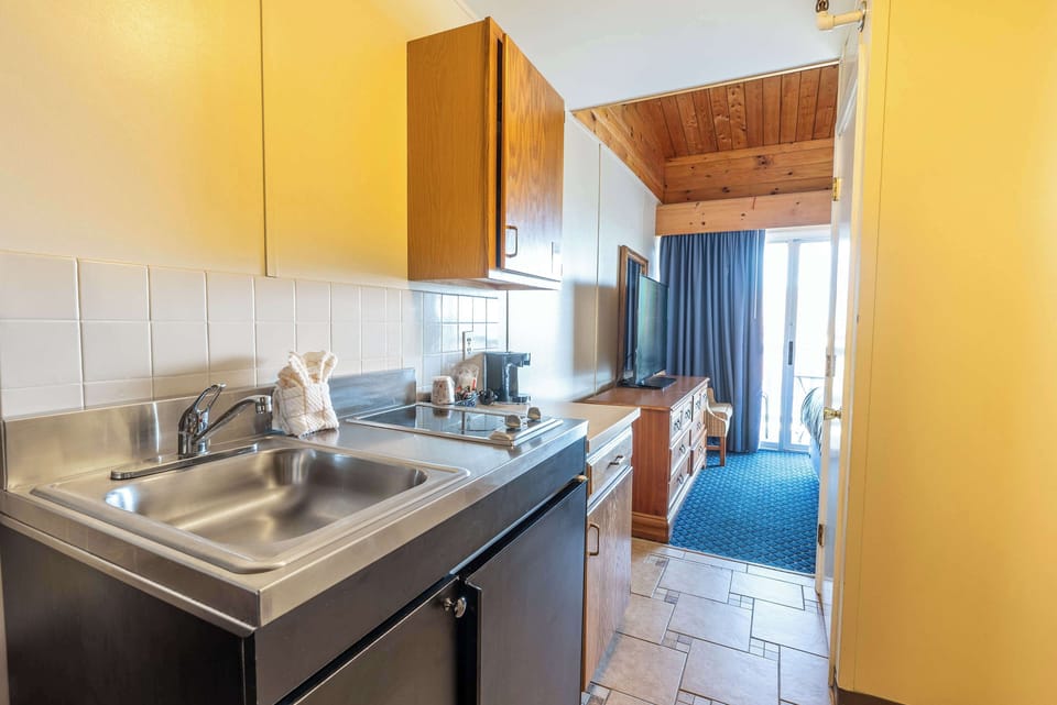 Building F Partial Ocean View | Private kitchenette | Coffee/tea maker