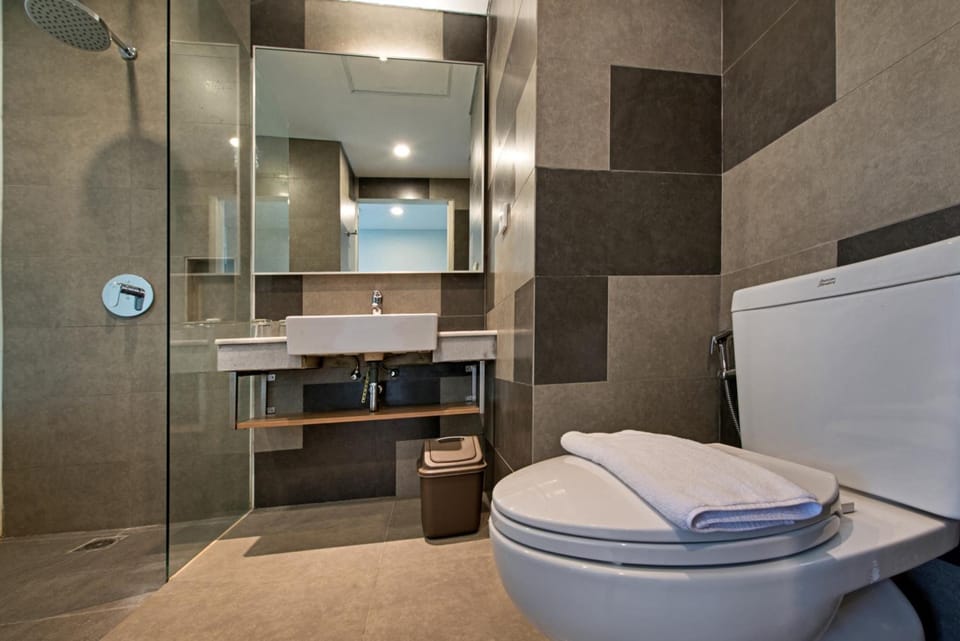 Shower, free toiletries, slippers, towels