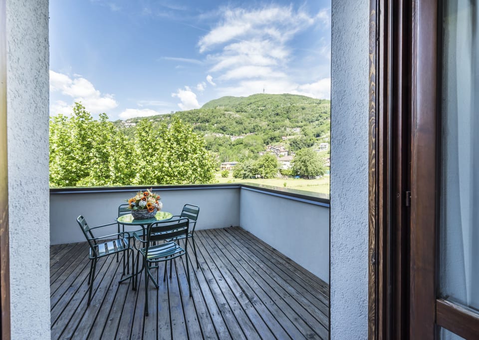 Family Room, Terrace | Minibar, desk, WiFi (free), bed sheets