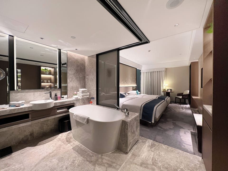 Family Room, Multiple Beds | Minibar, in-room safe, blackout drapes, soundproofing