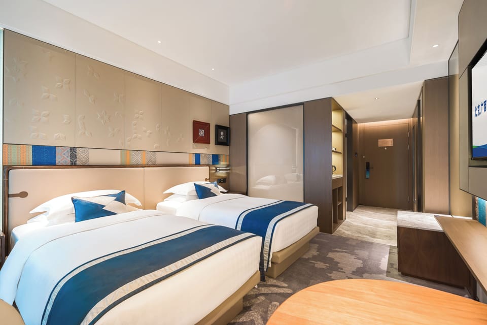 Business Twin Room | Minibar, in-room safe, blackout drapes, soundproofing