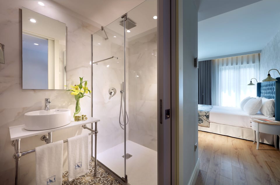 Shower, rainfall showerhead, eco-friendly toiletries, hair dryer
