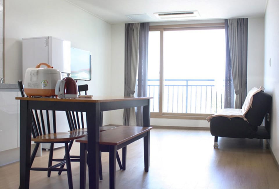 Family Room (Separate bedroom and living room) | Living area | Flat-screen TV
