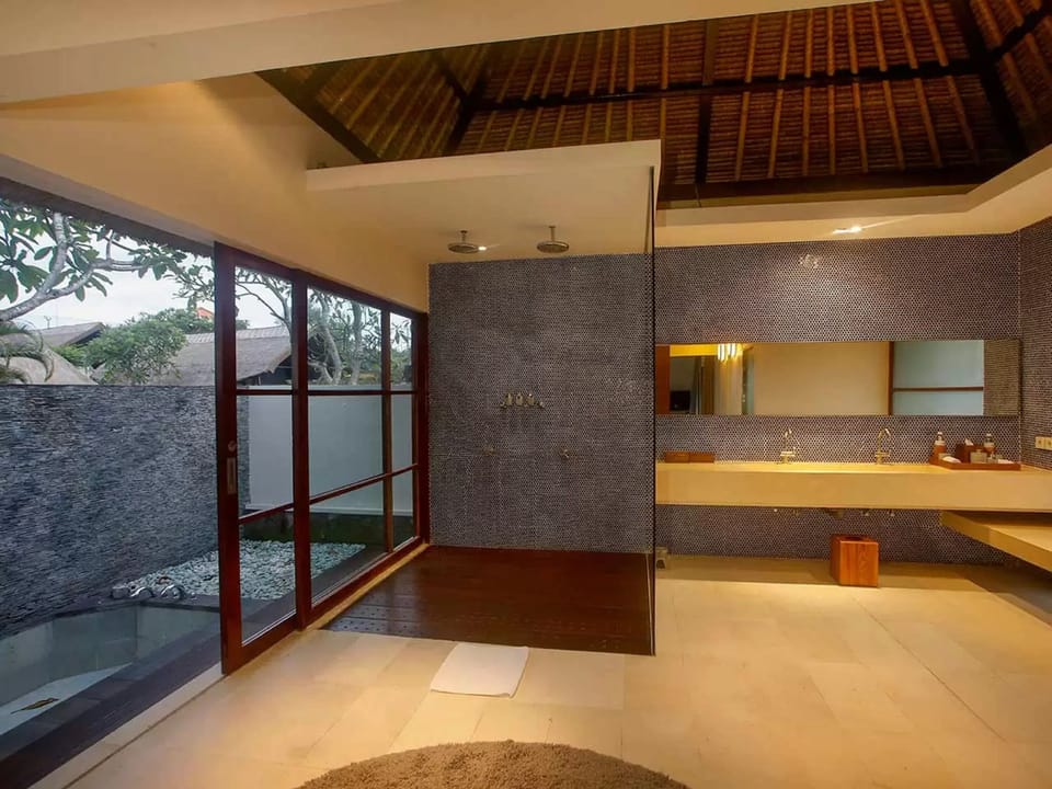 One Bedroom Private Pool Villa | Bathroom | Separate tub and shower, rainfall showerhead, eco-friendly toiletries