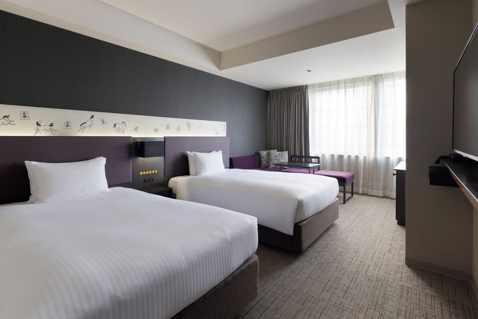 Down comforters, desk, free WiFi, bed sheets