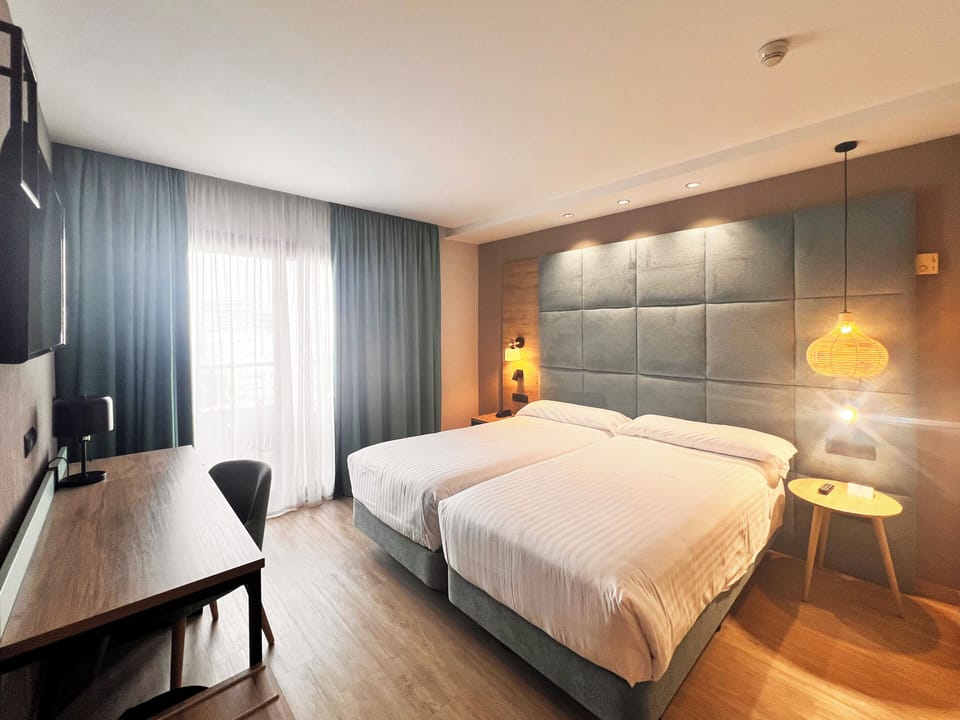 Superior Room | Minibar, in-room safe, desk, blackout drapes