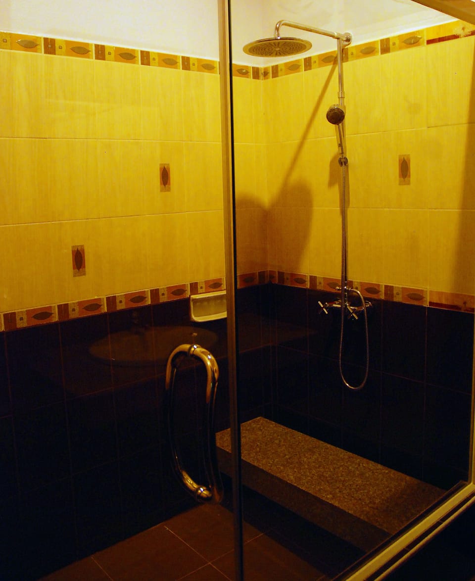 Family Bungalow, Multiple Beds | Bathroom | Shower, free toiletries, hair dryer, slippers