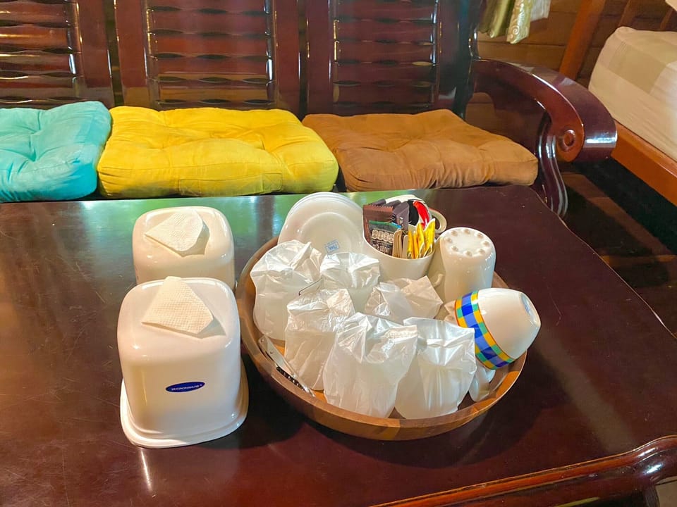 Family Bungalow, Multiple Beds | Living area | 24-inch TV with cable channels